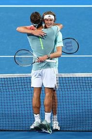 PERTH, AUSTRALIA - JANUARY 04: Roger Federer of Switzerland hugs Alexander Zverev of Germany after winning the mixed doubles match with Belinda Bencic on day four of the 2017 Hopman Cup at Perth Arena on January 4, 2017 in Perth, Australia.  (Photo by Paul Kane/Getty Images)